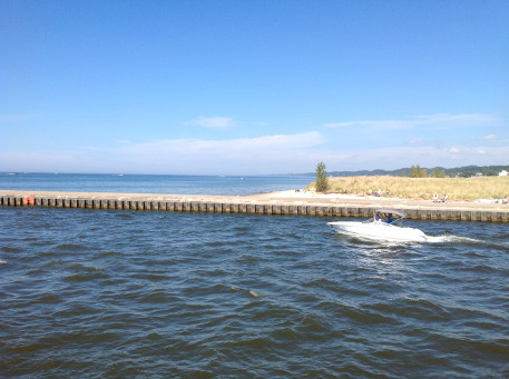 The shore looking north from Grand Haven channel.